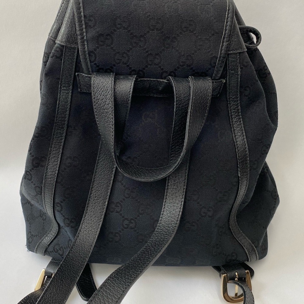 Gucci Black GG Canvas Drawstring Backpack with Gold Accent - Picture 7 of 14